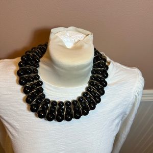 Bulky beaded black necklace with gold trim